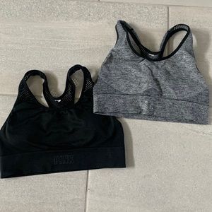2 pink sports bras. size small